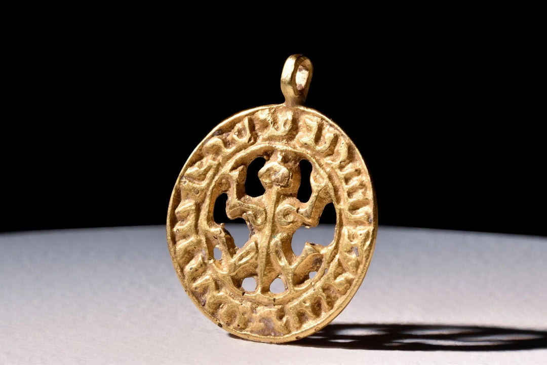 Andalusian Gold Zoomorphic Pendant - 9th to 11th Century CE | Pseudo-Arabic Calligraphy